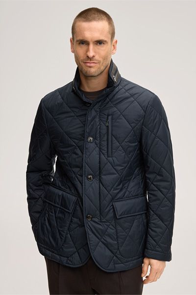 Marineblaue Steppjacke mit Stehkragen und aufgesetzten Pattentaschen