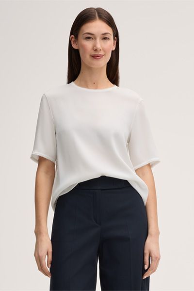 Marc Cain Crêpe Ecru Kurzarmbluse mit Fransenbesatz