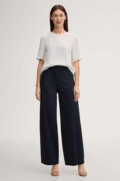 Marc Cain Crêpe Ecru Kurzarmbluse mit Fransenbesatz