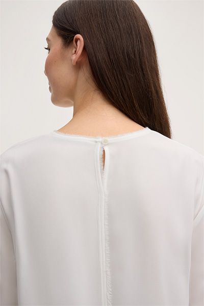 Marc Cain Crêpe Ecru Kurzarmbluse mit Fransenbesatz