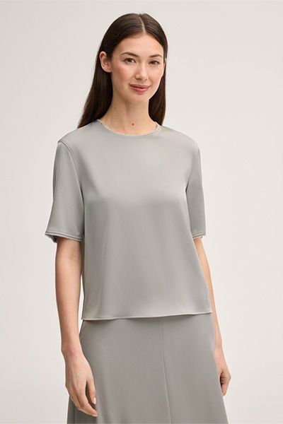 Crêpe Kurzarmbluse in Greige mit Fransensaum
