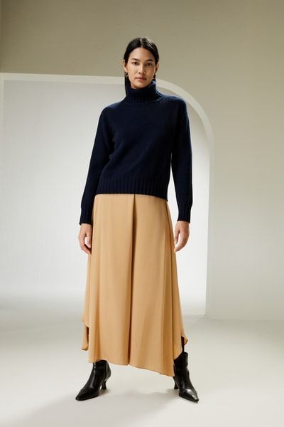 Rollkragenpullover mit geripptem Saum