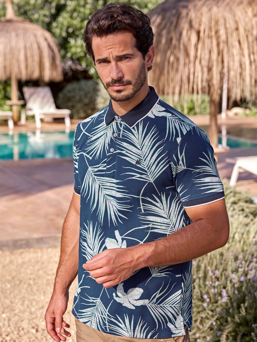 Piqué Poloshirt mit tropischem Blumenmuster