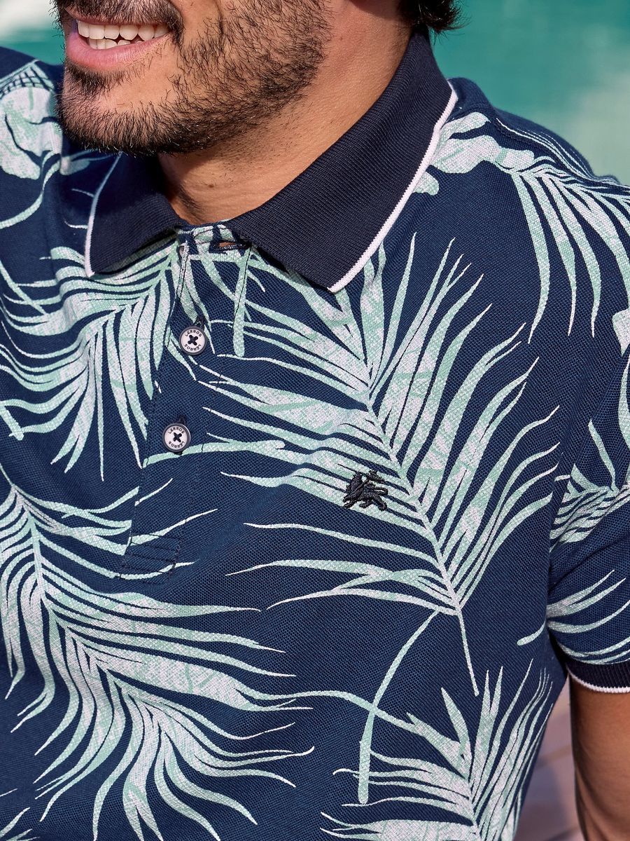 Piqué Poloshirt mit tropischem Blumenmuster