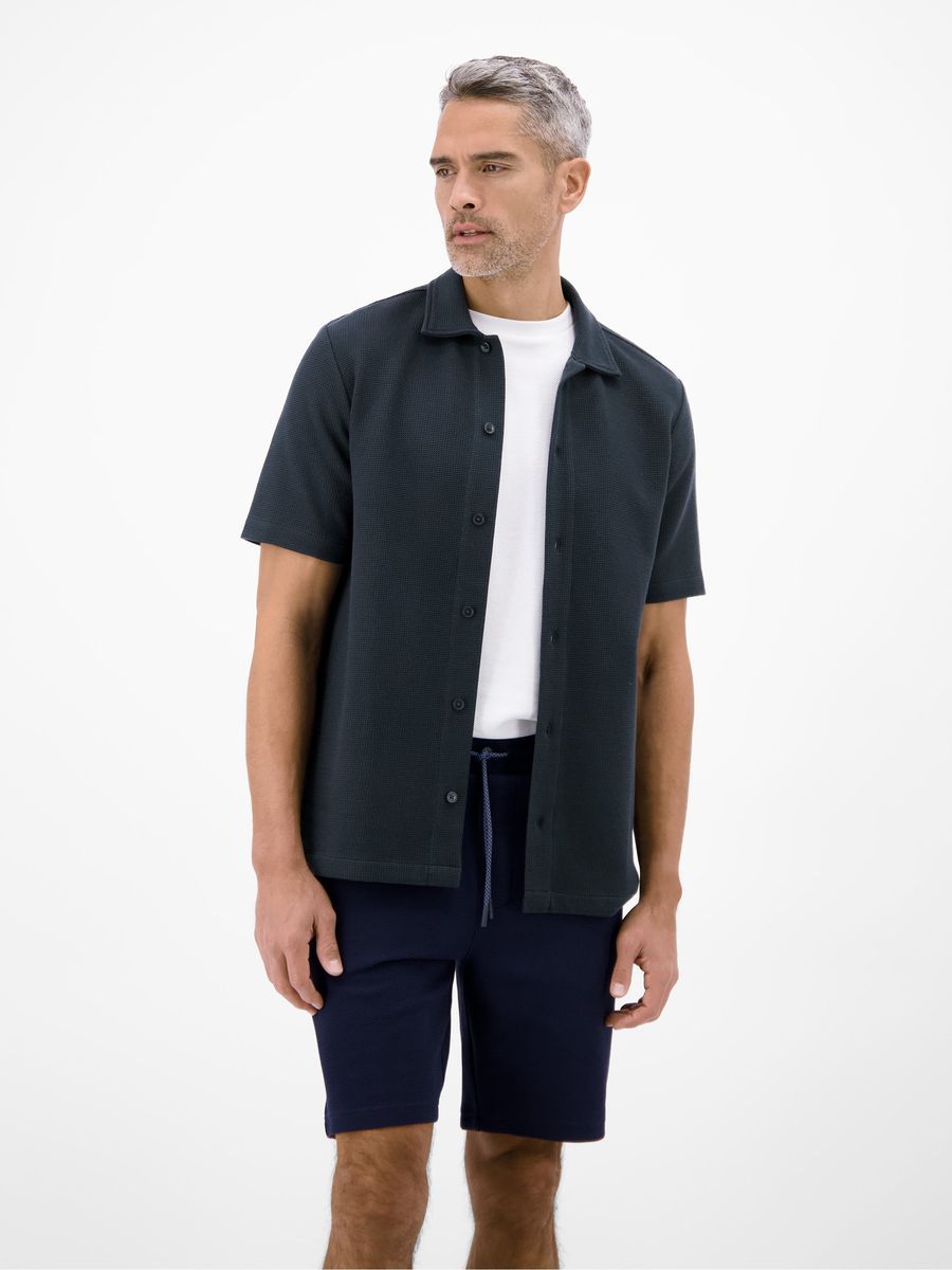 Marineblaues Waffelstrick-Poloshirt mit Knopfleiste