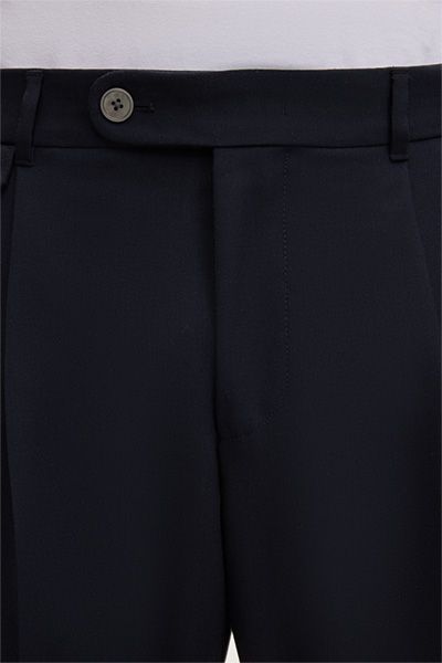 Marineblaue Wollhose Serpo mit Bundfalte und Münztaschendetail