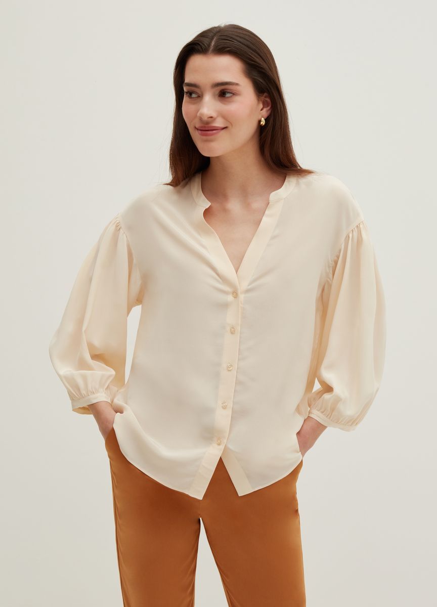 Elegante Bluse mit Knopfleiste und Ballonärmeln