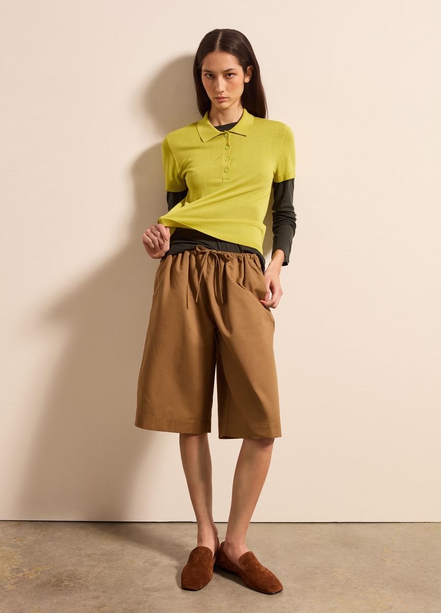 Elegante Bluse mit Knopfleiste und Ballonärmeln