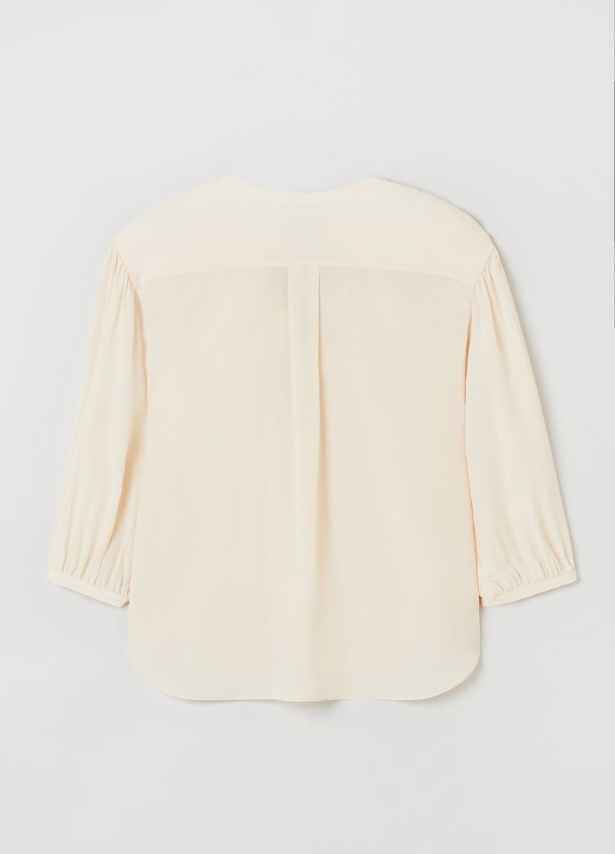 Elegante Bluse mit Knopfleiste und Ballonärmeln