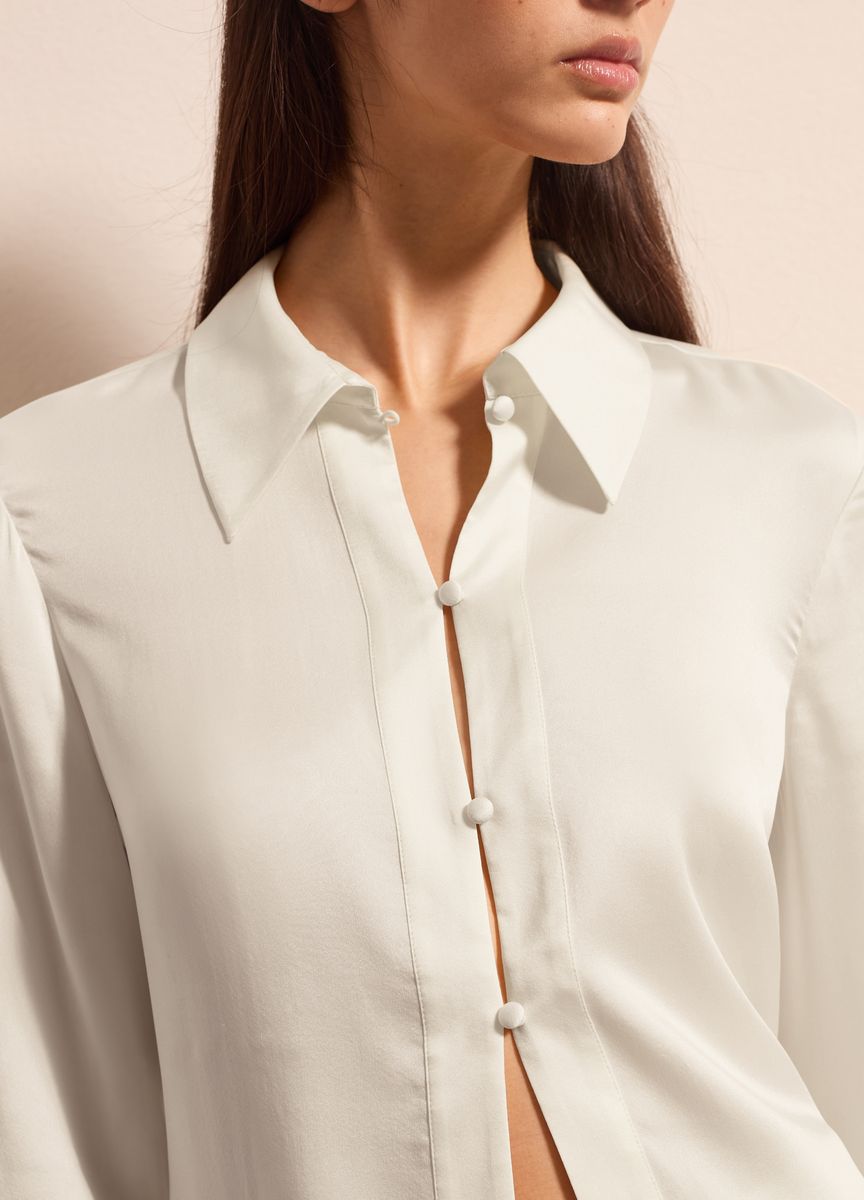 Elegante Bluse mit Knopfleiste und Ballonärmeln