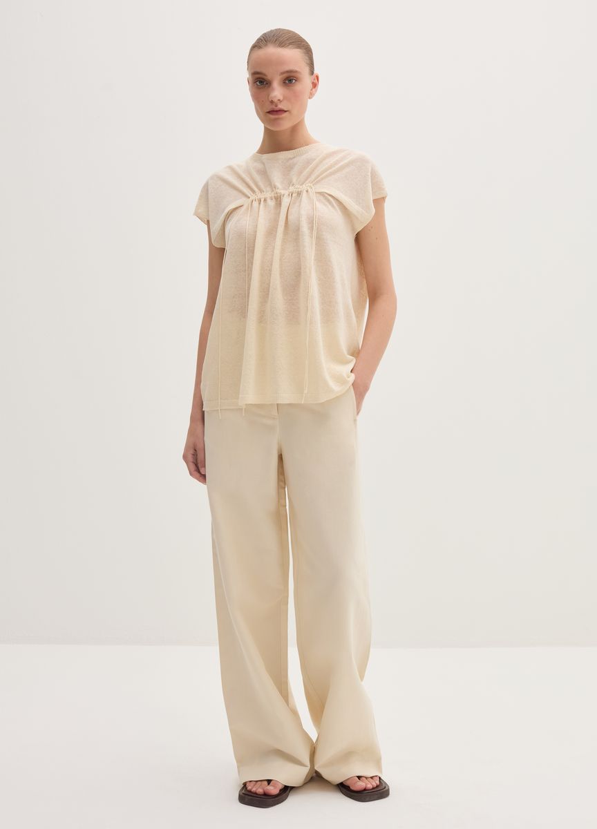 Blassrosa Midikleid mit transparentem Überzug