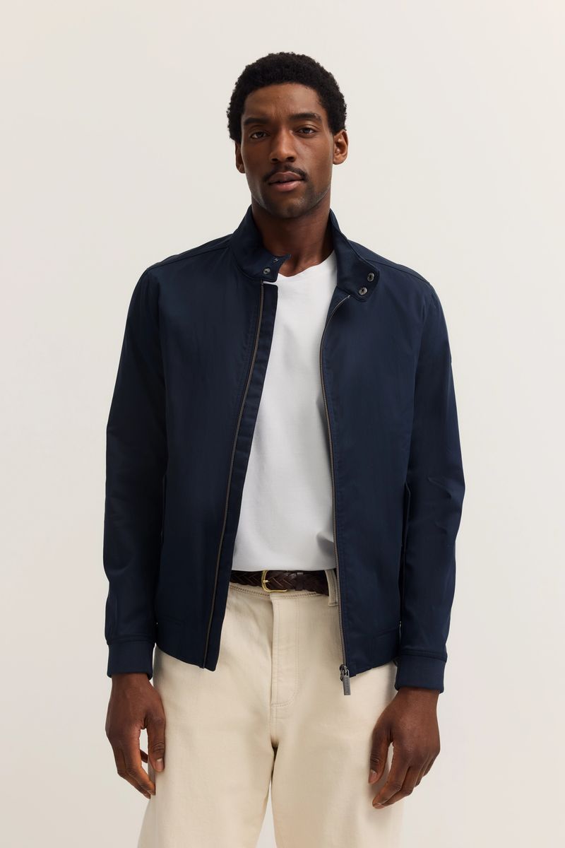 Moderne marineblaue Blousonjacke mit Stehkragen