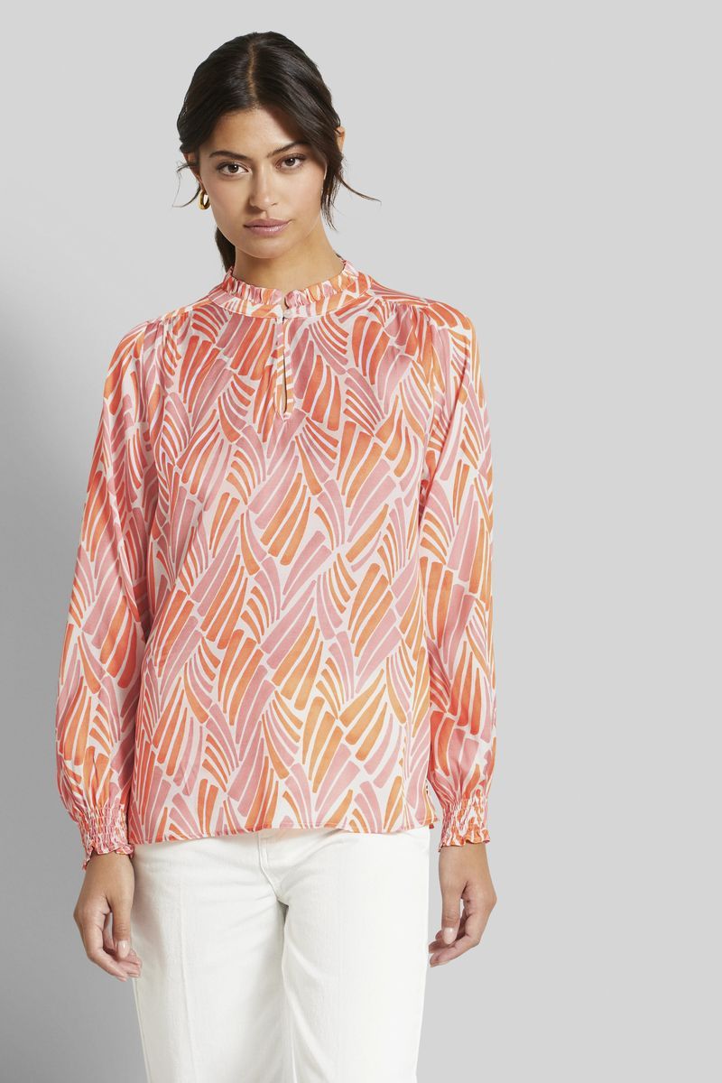 Fließende gemusterte Bluse mit Rüschenkragen