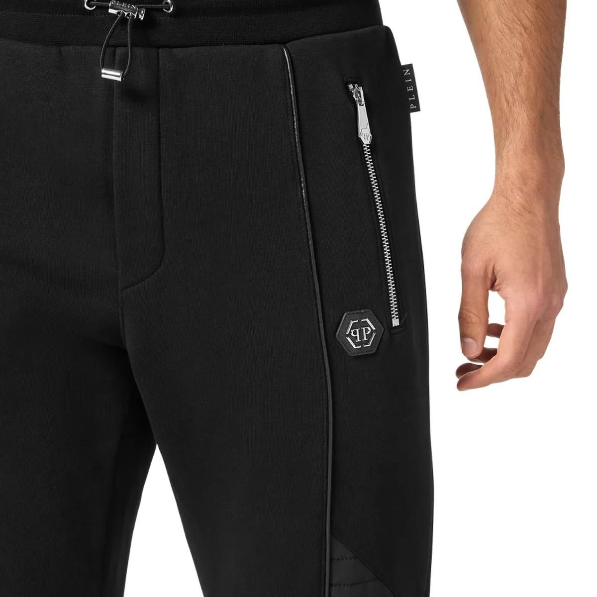 Schwarze Jogginghose aus Baumwollfleece mit Einsätzen