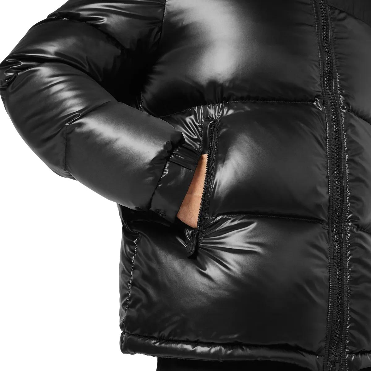 Glänzende schwarze Steppdaunenjacke