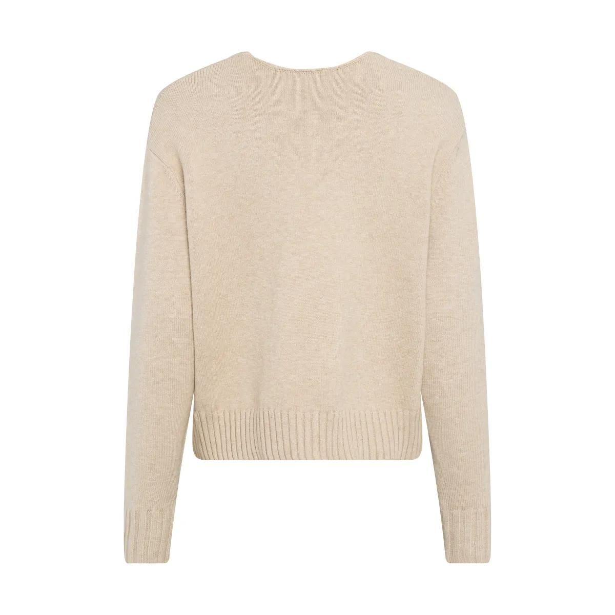 Elegante Strickjacke mit Perlenapplikation