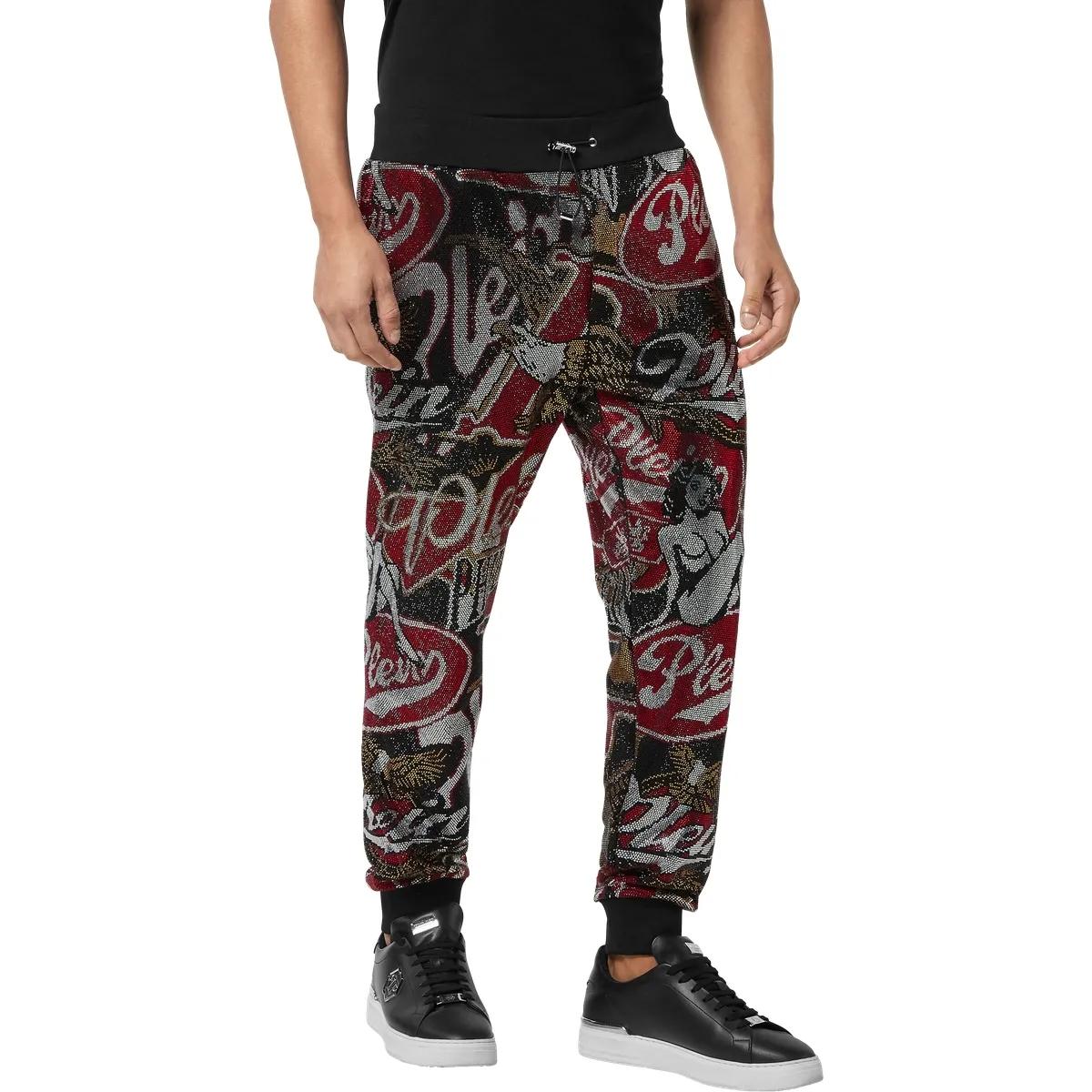 Gemusterte Fleece-Jogginghose mit Logo-Applikation