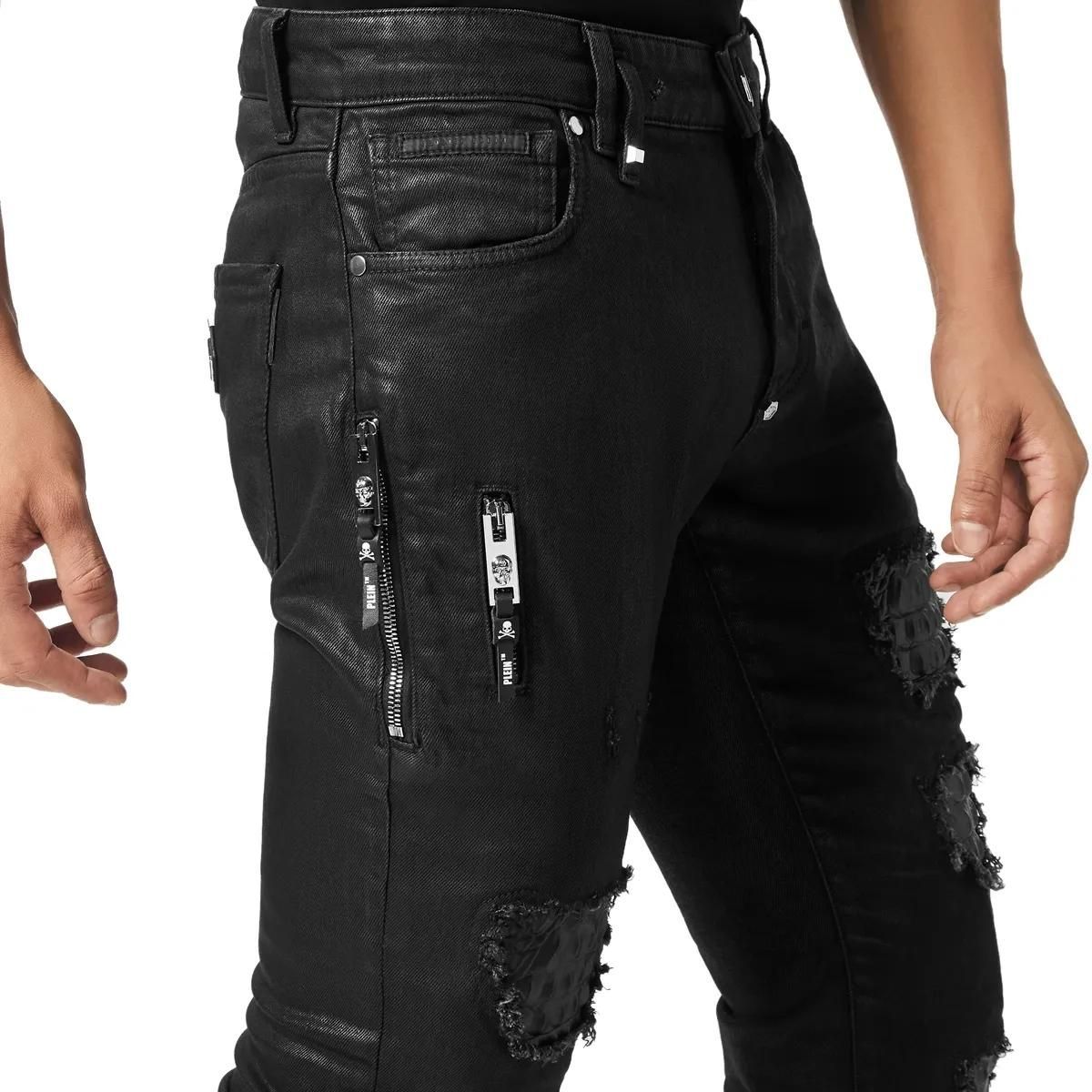Schwarze Distressed Rockstar Fit Jeans