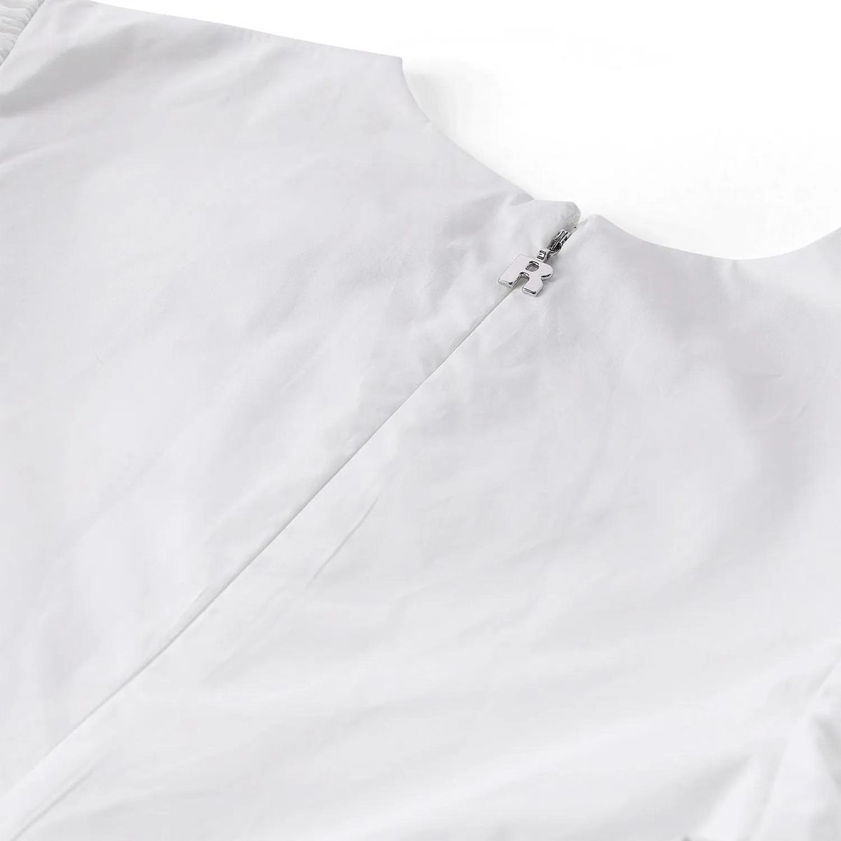 Bluse mit Puffärmeln und Rüschensaum