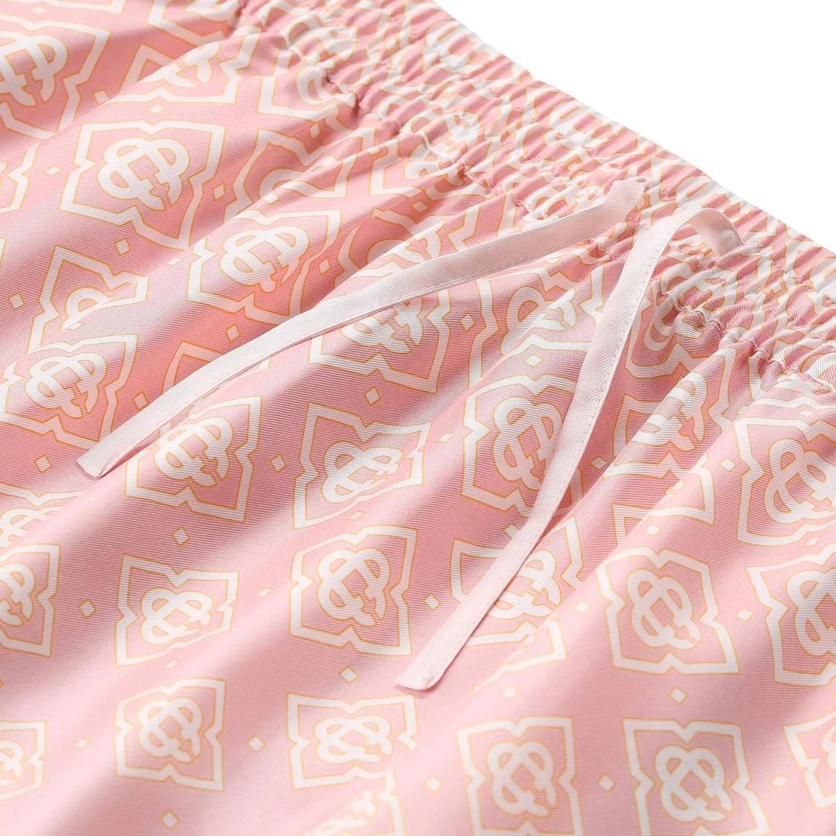 Rosa Seiden-Midi-Rock mit Monogramm