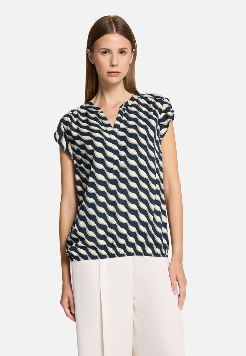 Blusentop mit welligem geometrischem Muster