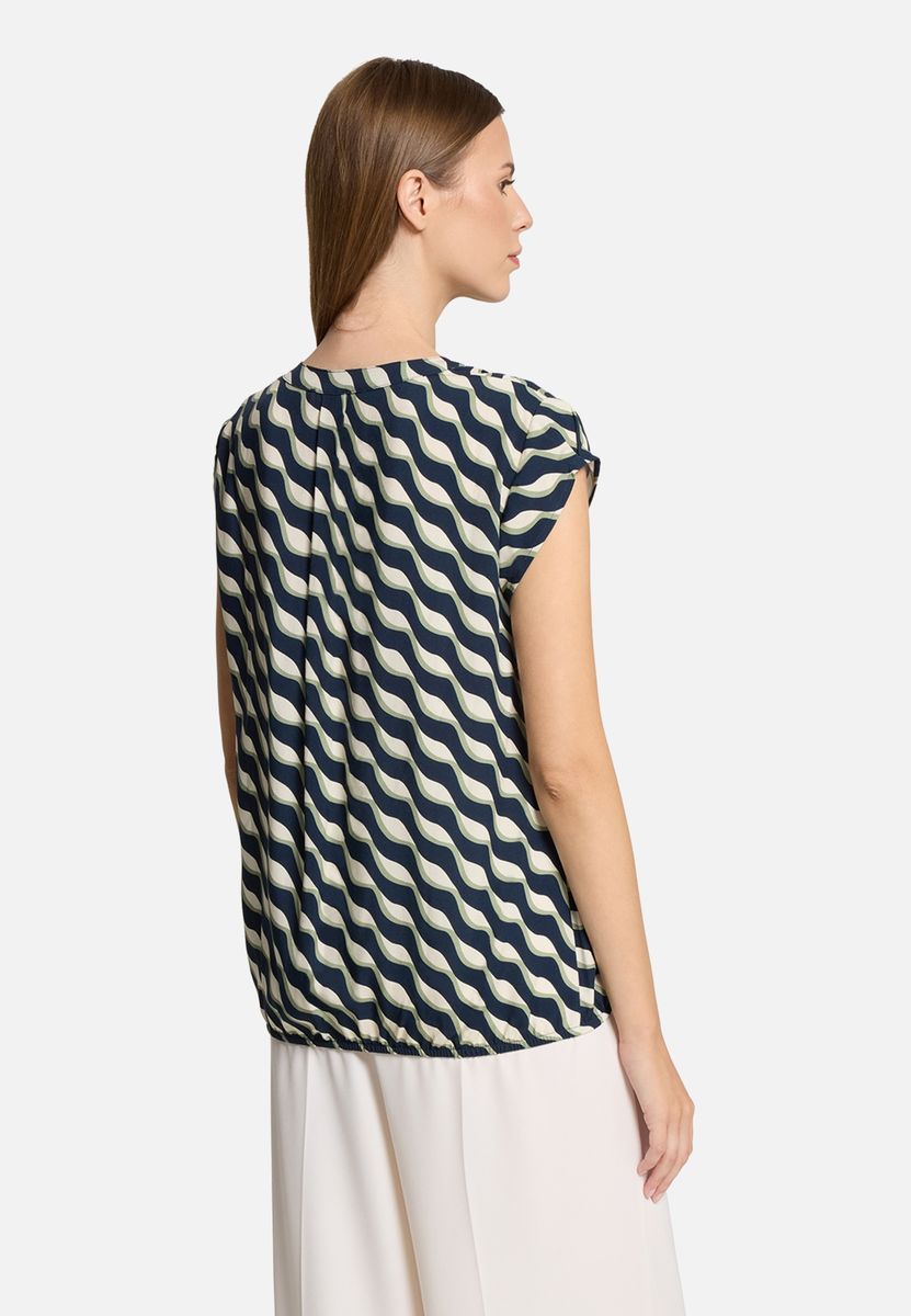 Blusentop mit welligem geometrischem Muster