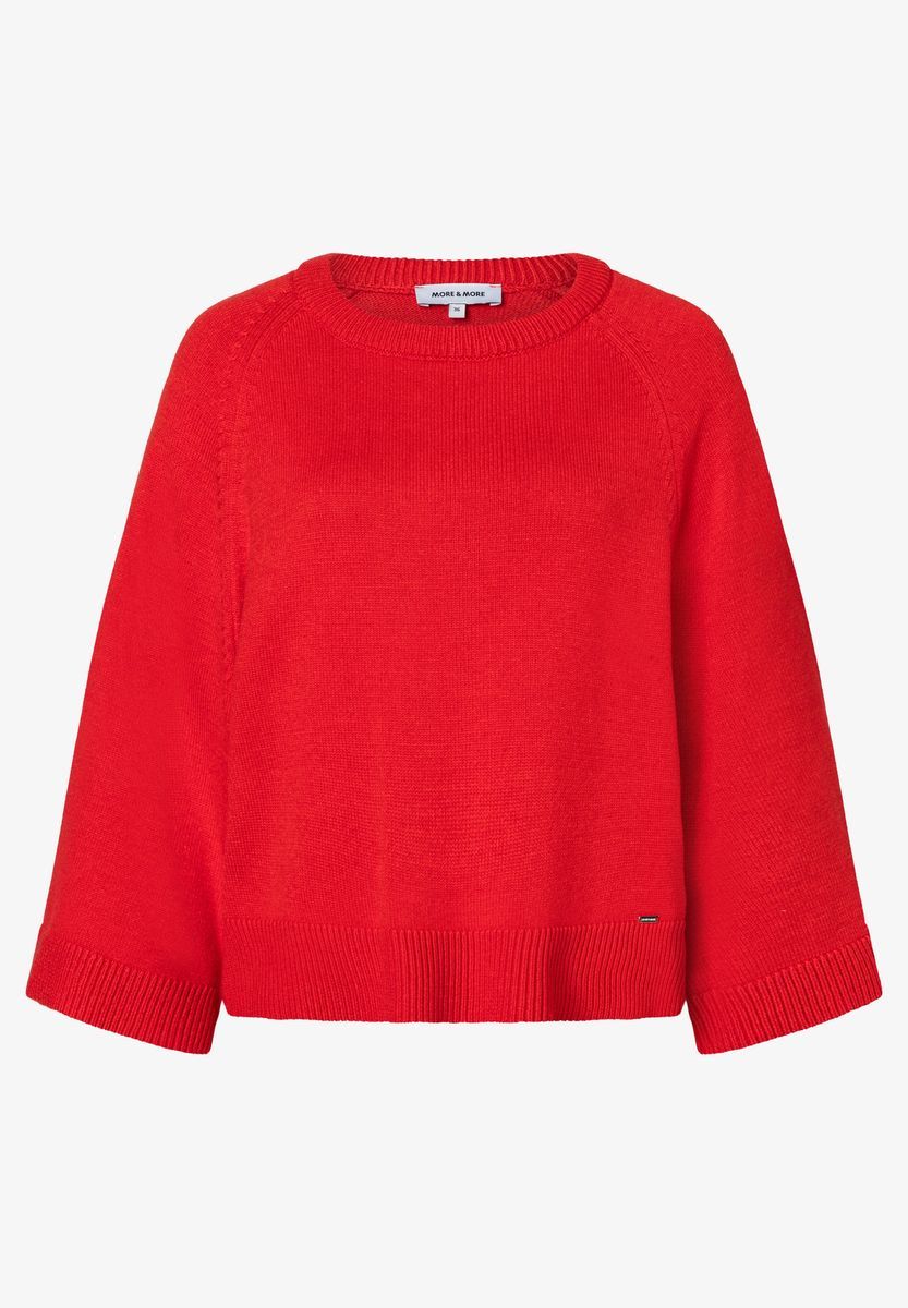 Roter Strickpullover mit weiten Ärmeln
