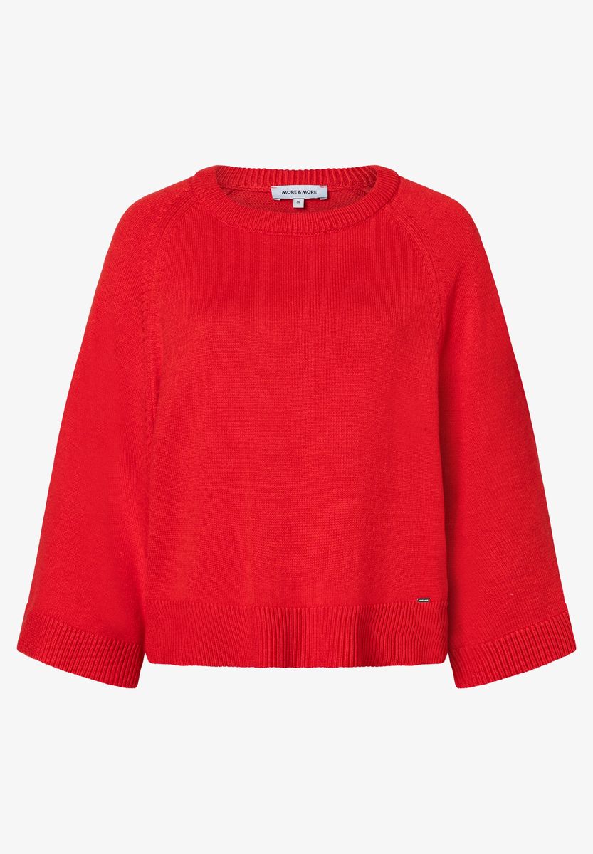 Roter Strickpullover mit weiten Ärmeln