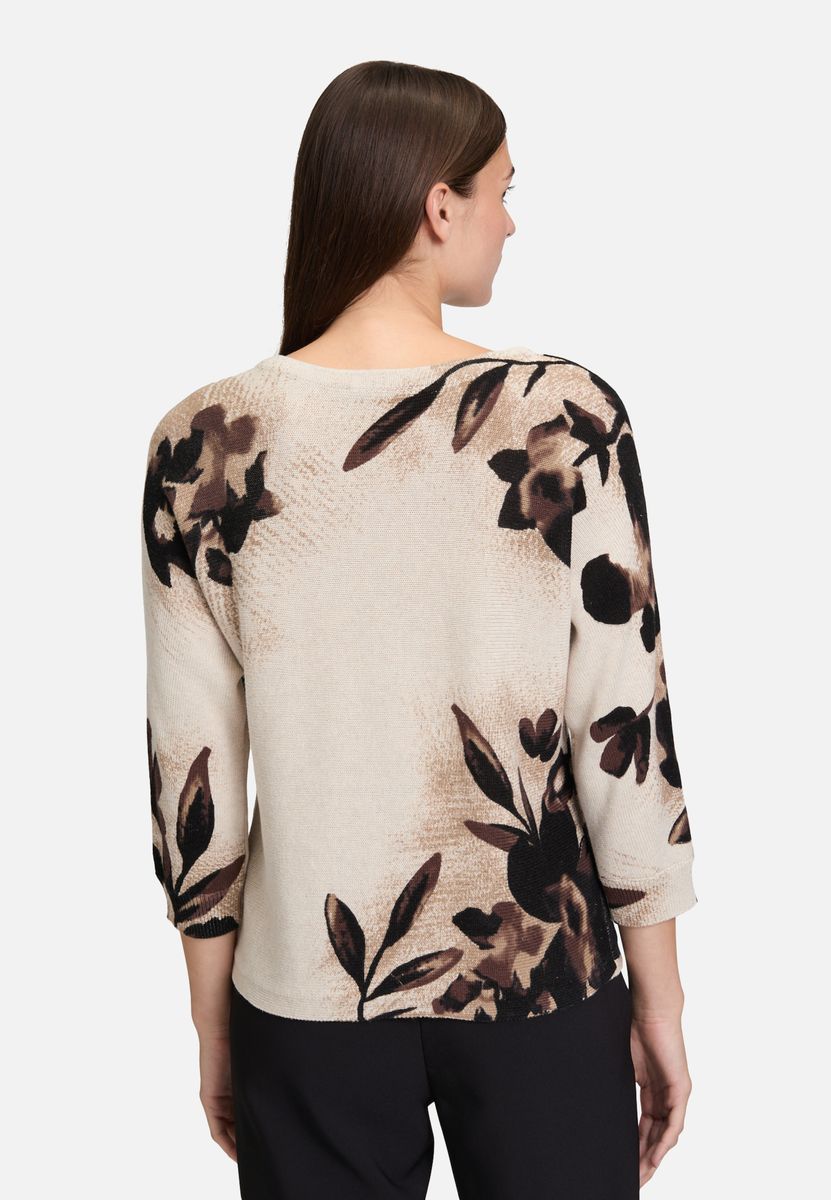 Strickpullover mit Blumenmuster und Applikationen