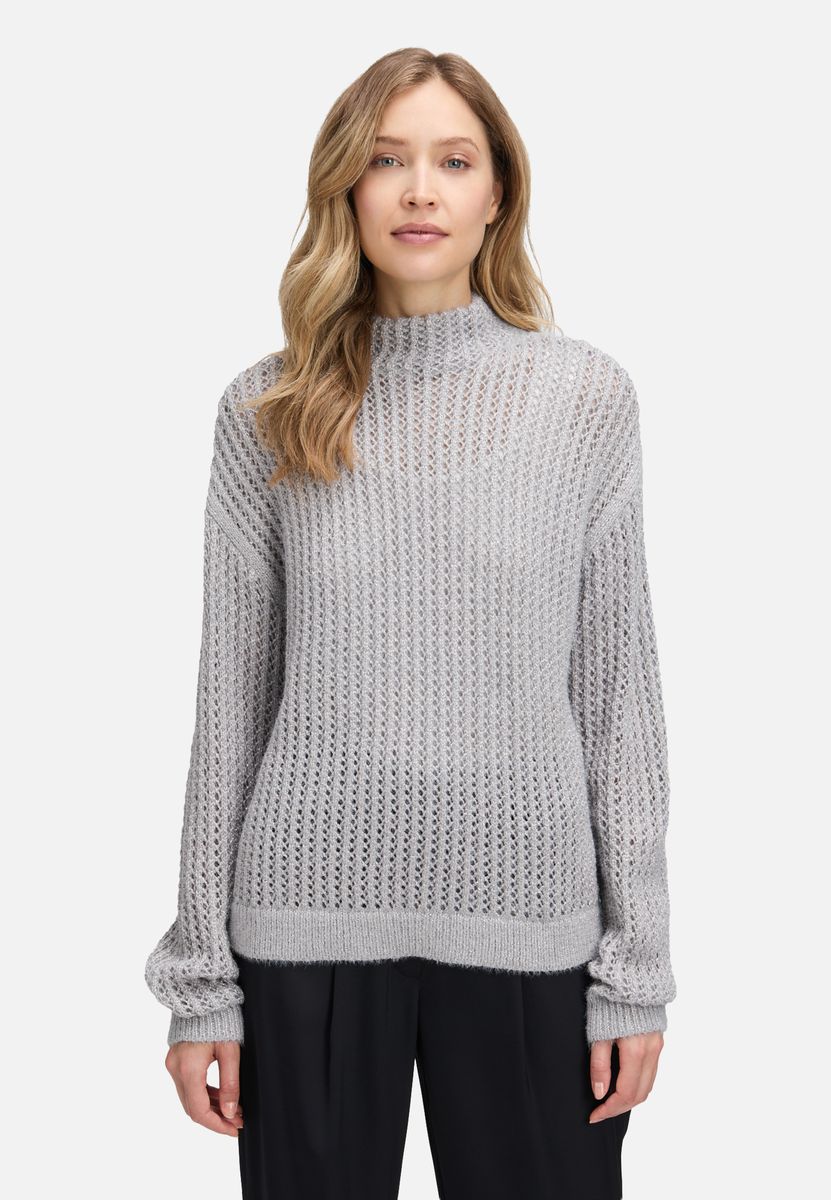 Glitzernder Ajour-Strickpullover mit Stehkragen
