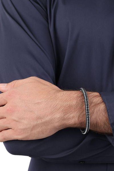 Armband mit Anhänger in Schwarz/Silber