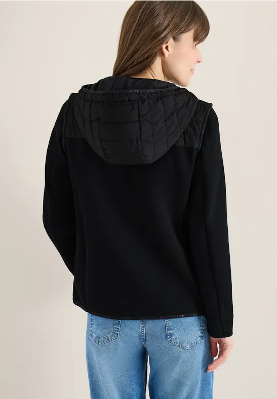 Gesteppte Jacke mit Softshell-Ärmeln