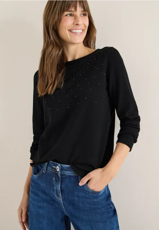 Elegantes verziertes Strickoberteil