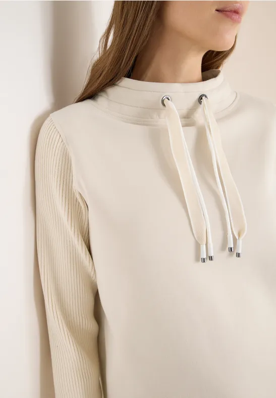 Beiges Sweatshirt mit gerippten Strickärmeln