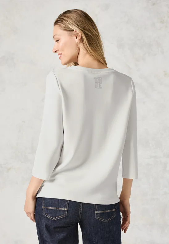 Lässiges weißes T-Shirt mit Grafikprint