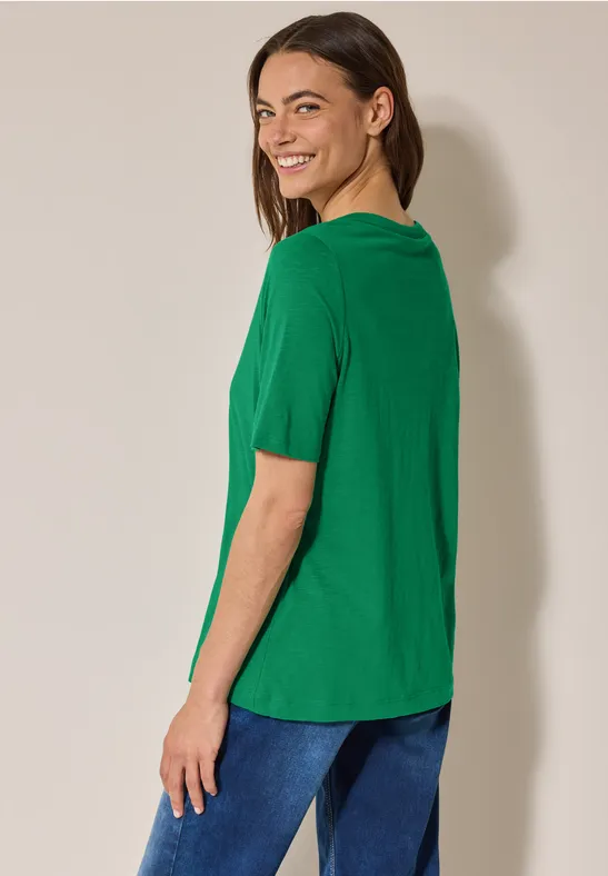 Grünes T-Shirt im Tunika-Stil mit V-Ausschnitt