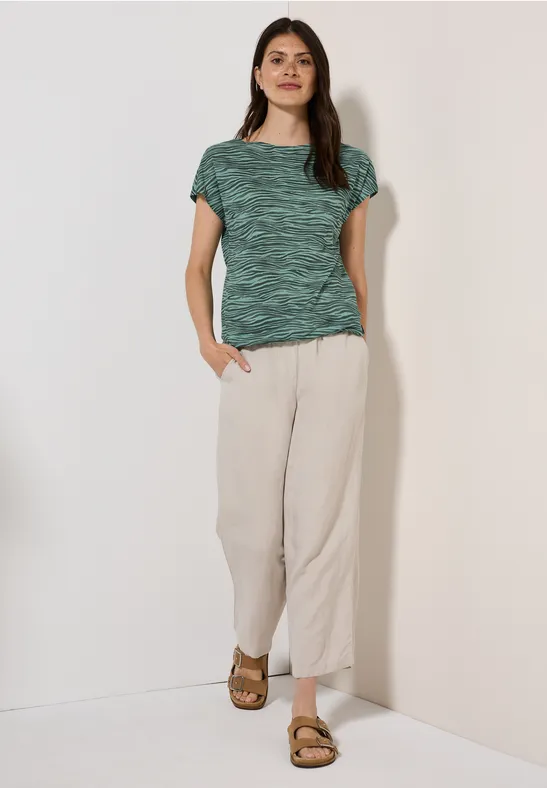 Grünes T-Shirt mit Zebra-Print und lockerer Passform