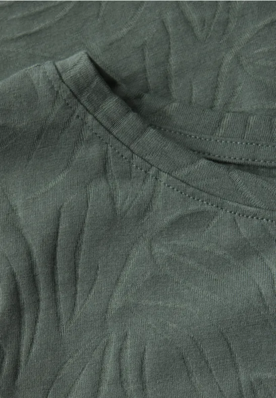 Olivgrünes Baumwoll-T-Shirt mit Blätterdruck