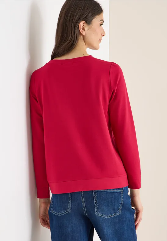 Locker geschnittenes Langarmshirt mit Grafik
