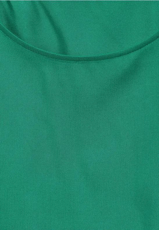 Grüne Bluse mit Ärmeldetail zum Binden