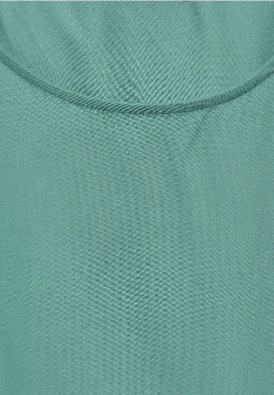 Grüne Bluse mit Ärmeldetail zum Binden