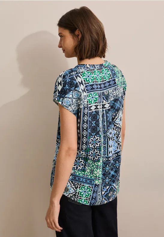 Bluse mit Patchworkmuster und V-Ausschnitt