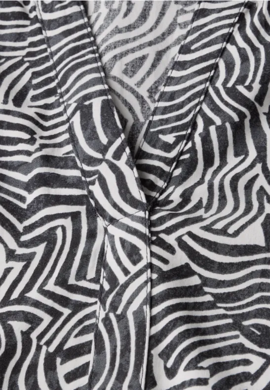 Gemusterte Bluse mit V-Ausschnitt und Kurzarm