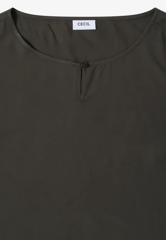 Elegante einfarbige grüne Bluse mit Cut-Out