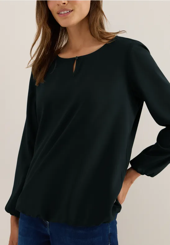 Elegante einfarbige grüne Bluse mit Cut-Out