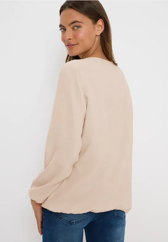 Beige Langarmbluse mit Rundhalsausschnitt