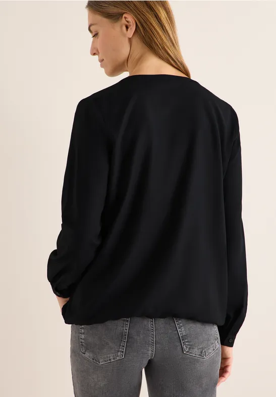 Bluse mit geschlitztem Ausschnitt und lockerer Passform