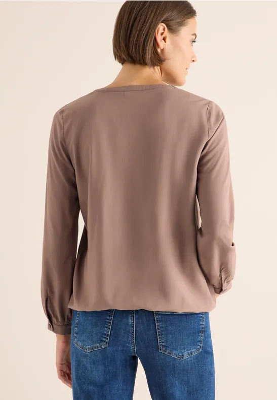 Bluse mit geschlitztem Ausschnitt und lockerer Passform