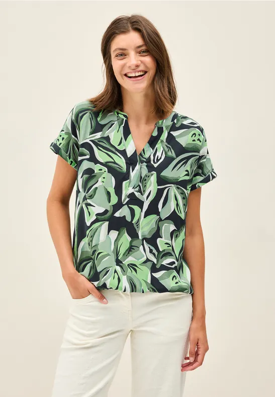 Bluse mit Blätterdruck und V-Ausschnitt