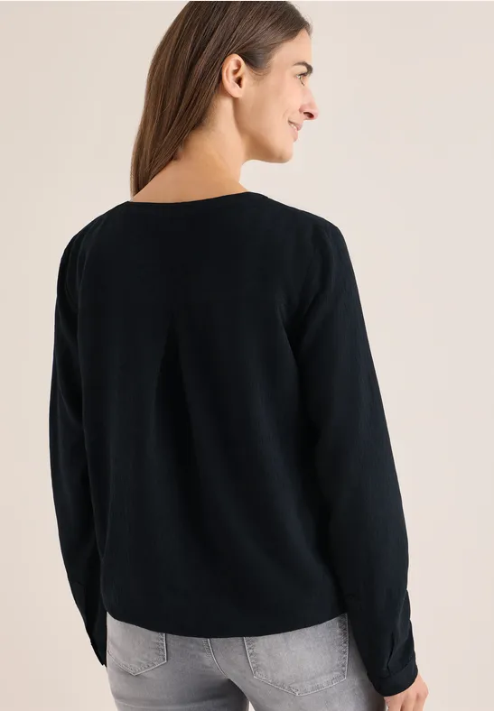 Elegante einfarbige Bluse mit Schlitzkragen